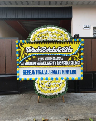 Papan Bunga Duka di Tanah Tumbuh