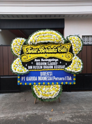 Papan Bunga Duka di Tanah Tumbuh
